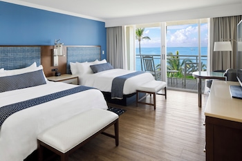 Premium bedding, in-room safe, individually decorated at Reefhouse Resort & Marina