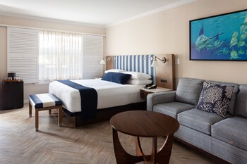 Premium bedding, in-room safe, blackout drapes, iron/ironing board at Reefhouse Resort & Marina