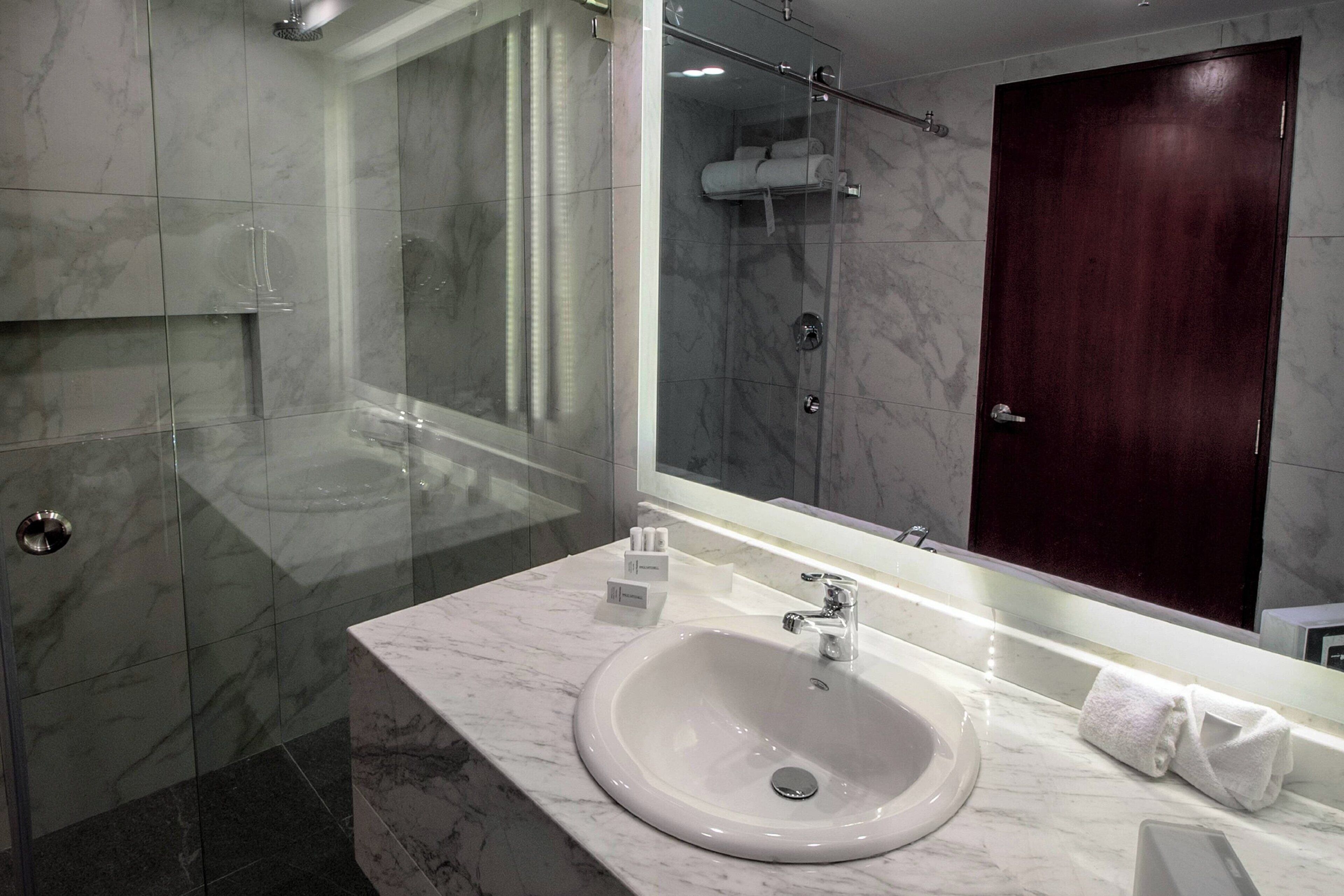 shower, free toiletries, hair dryer, towels