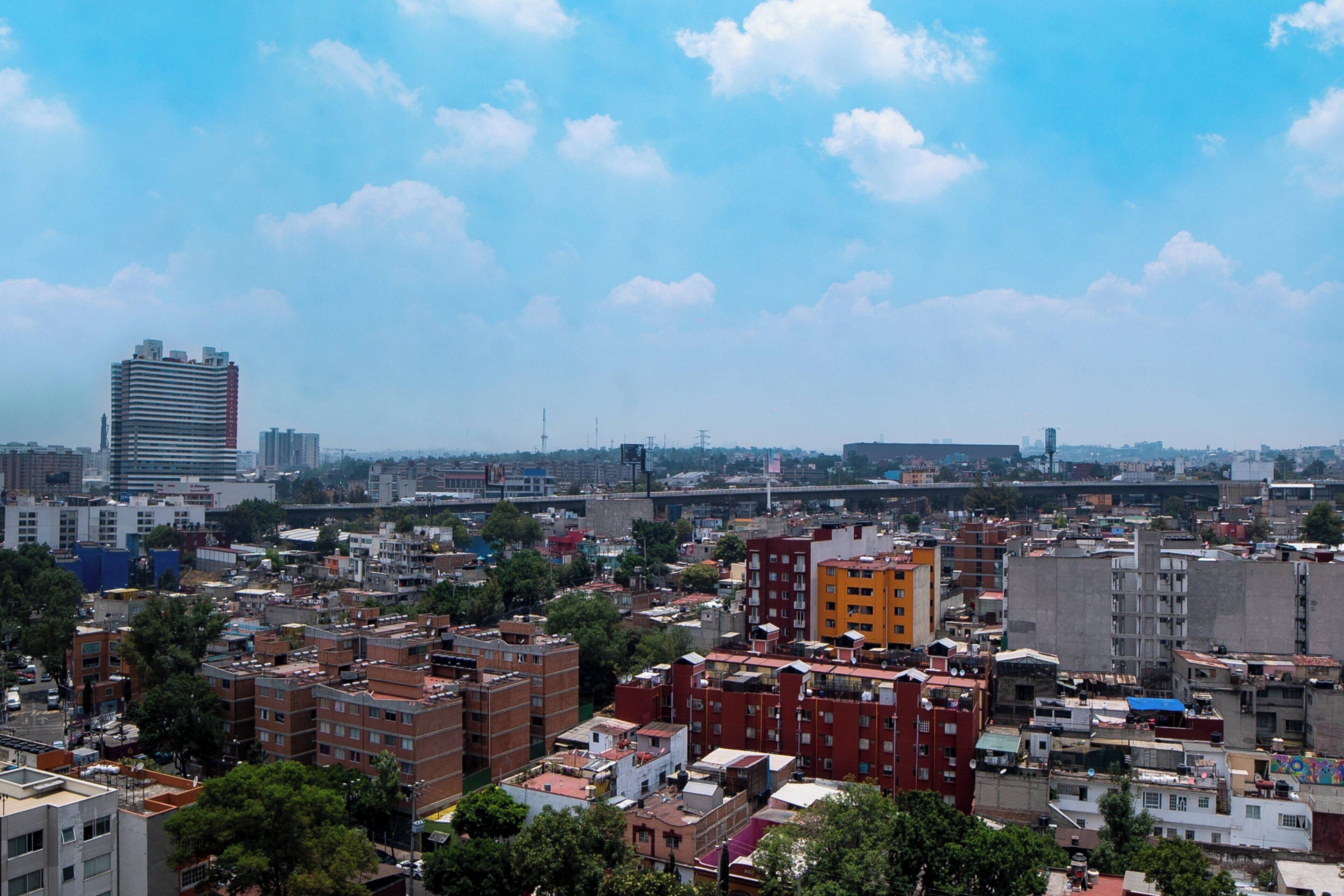 senior suite, 1 bedroom, city view | in-room safe, desk, blackout curtains, soundproofing