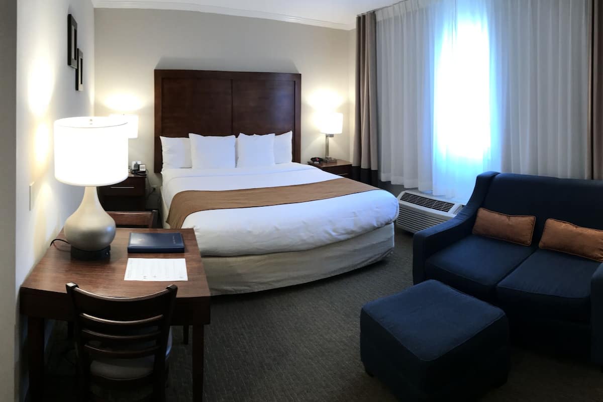 family room, 1 king bed, 1 queen bed and sofa bed, non smoking | pillow-top beds, in-room safe, individually furnished, desk