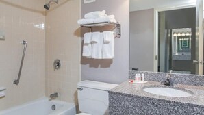 A bathroom with a shower, toilet, and sink. - SuperB Hamburg Motel (Hamburg)