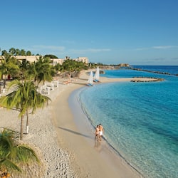 Private beach, white sand, sun loungers, beach umbrellas