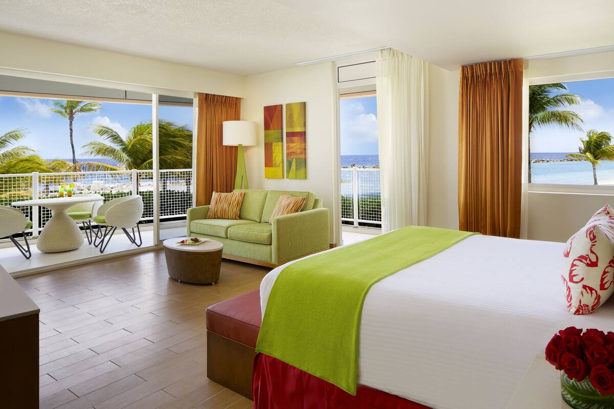Sun Club Honeymoon Junior Suite | Minibar (free items), in-room safe, desk, blackout drapes