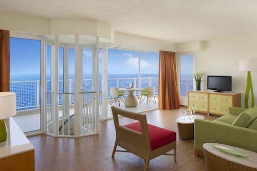 Suite presidencial | Sala d'estar | Televisor LCD i estació de connexió per a iPod