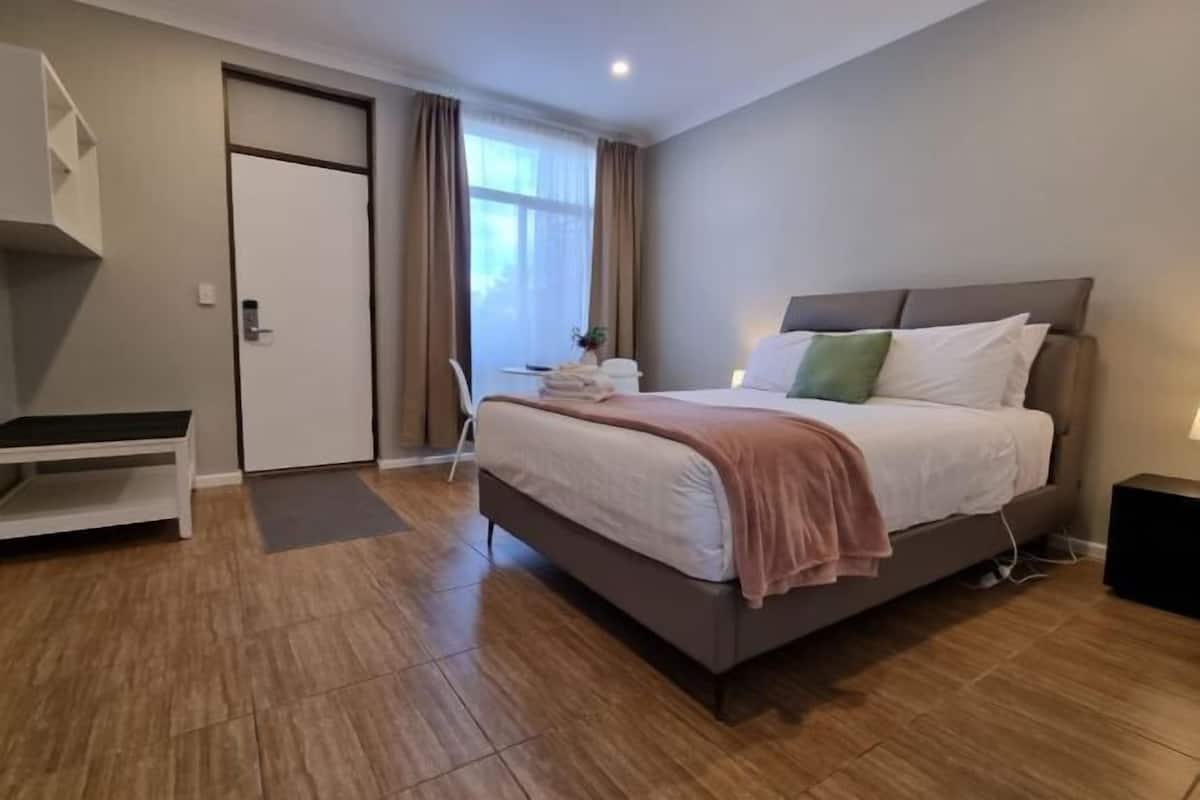 Blackout curtains, iron/ironing board, free WiFi, bed sheets