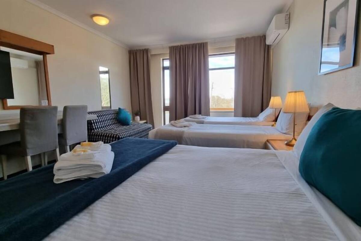 Blackout curtains, iron/ironing board, free WiFi, bed sheets