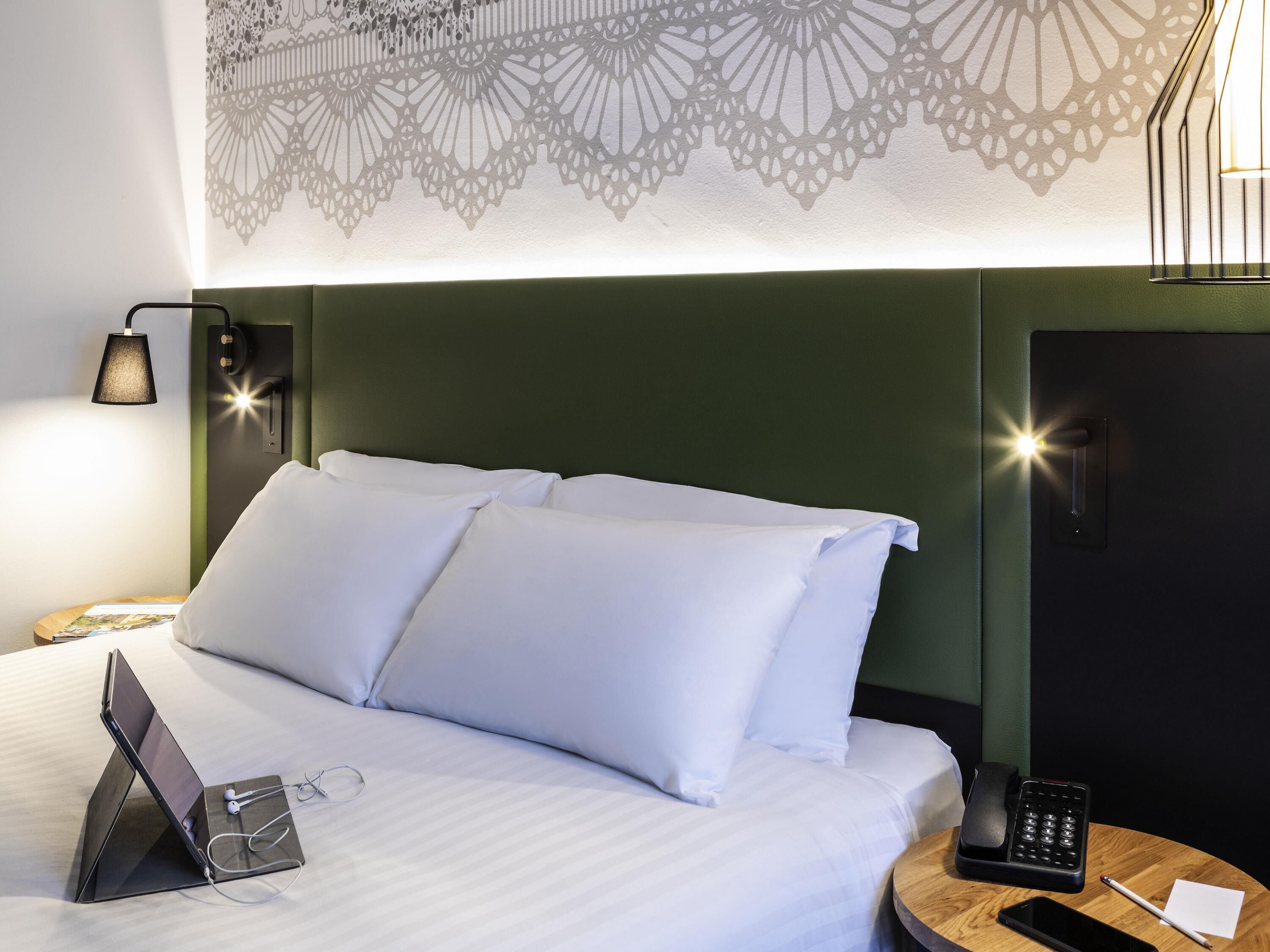 Hypo-allergenic bedding, in-room safe, desk, laptop workspace