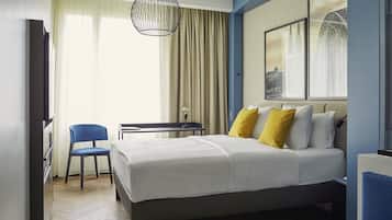 Rom – deluxe, 1 queensize-seng (Cathedral view) | 1 soverom, sengetøy av topp kvalitet, safe på rommet og skrivebord