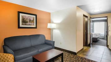 Premium bedding, desk, laptop workspace, blackout drapes