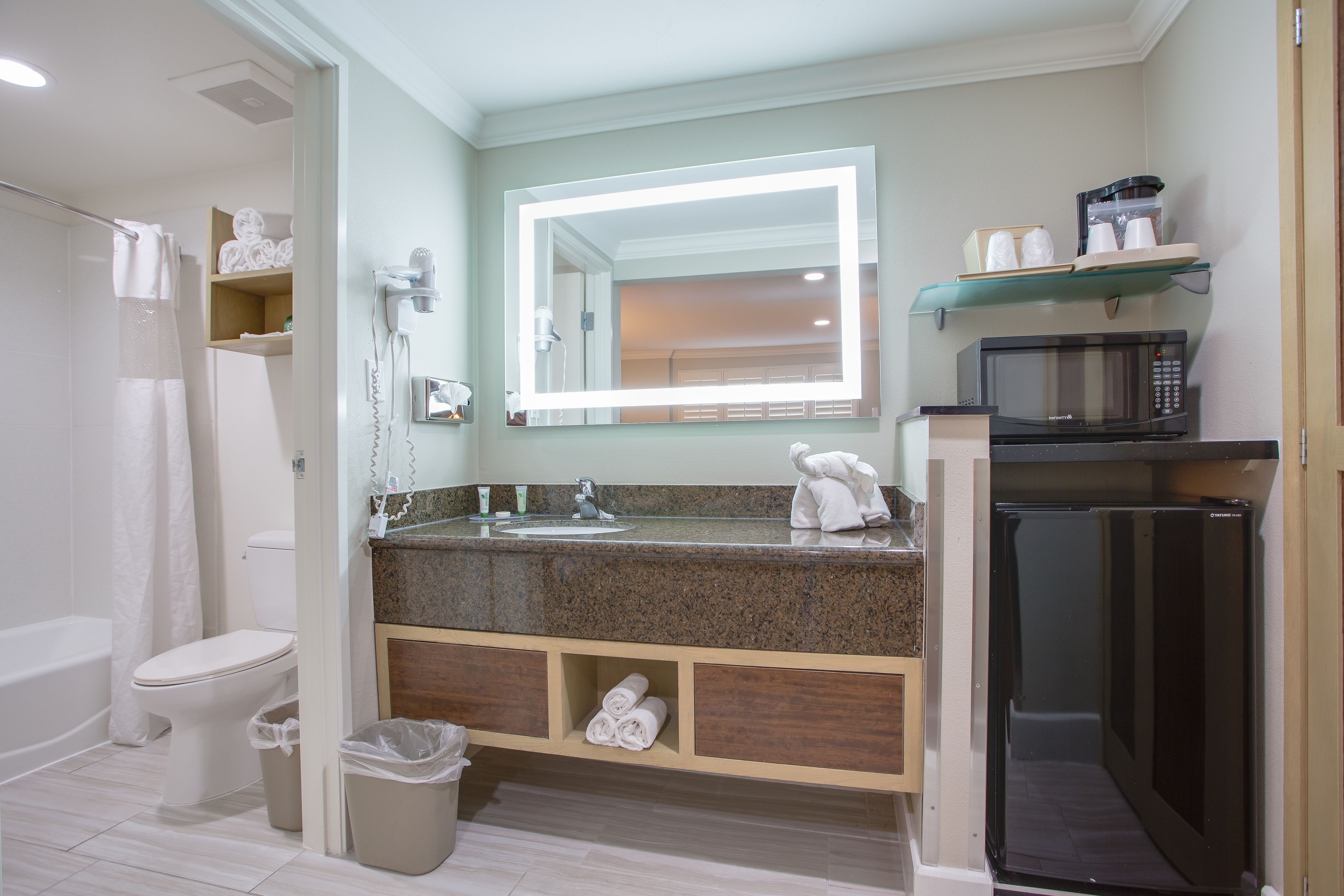 deluxe room, 2 queen beds (kids room with 2 queen beds and bunk) | bathroom | shower, eco-friendly toiletries, hair dryer, towels