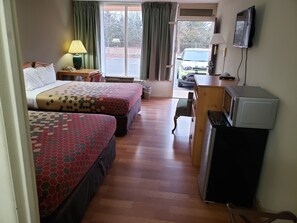 Deluxe Quadruple Room | Premium bedding, individually decorated, individually furnished, desk