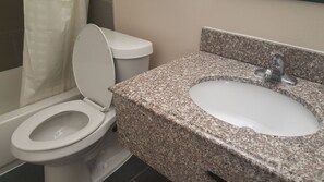 Combined shower/bathtub, free toiletries, hair dryer, towels