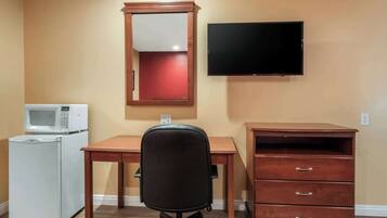 Hypo-allergenic bedding, desk, laptop workspace, blackout curtains