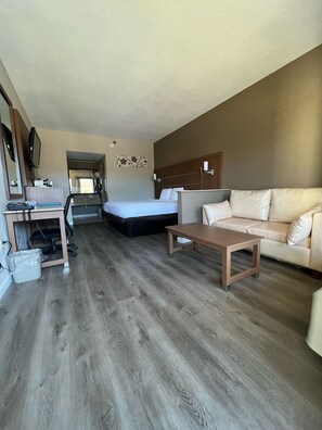 Suite, 1 King Bed with Sofa bed, Non Smoking | Desk, laptop workspace, iron/ironing board, free WiFi