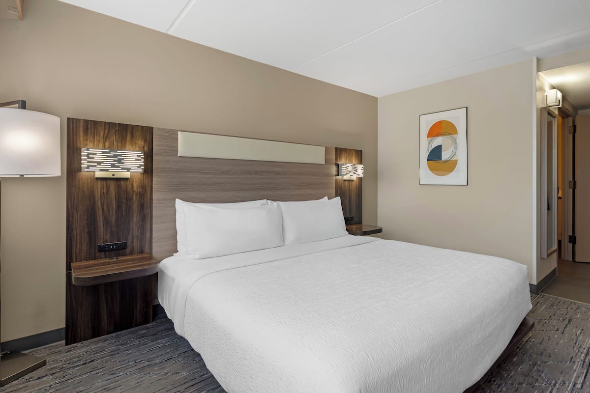 Desk, laptop workspace, blackout curtains, iron/ironing board