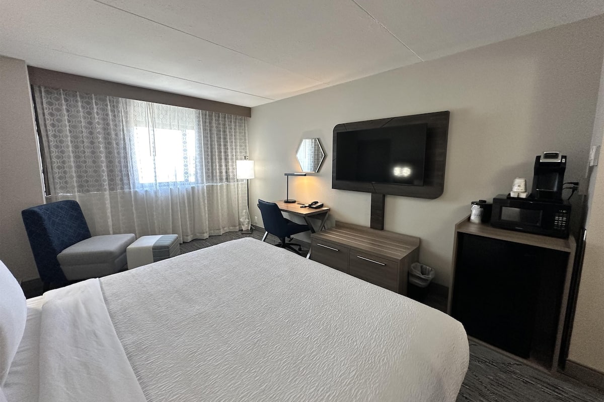 Desk, laptop workspace, blackout curtains, iron/ironing board