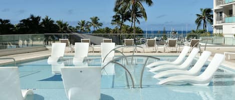 2 outdoor pools, pool umbrellas, pool loungers