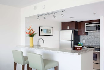 Fridge, microwave, oven, stovetop at Ilikai Hotel & Luxury Suites