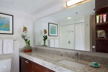 Eco-friendly toiletries, hair dryer, towels, soap at Ilikai Hotel & Luxury Suites