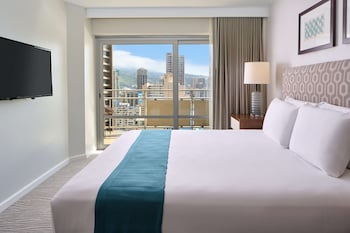 Luxury Room, 2 Bedrooms, Kitchen, City View | Premium bedding, pillowtop beds, in-room safe, blackout drapes at Ilikai Hotel & Luxury Suites