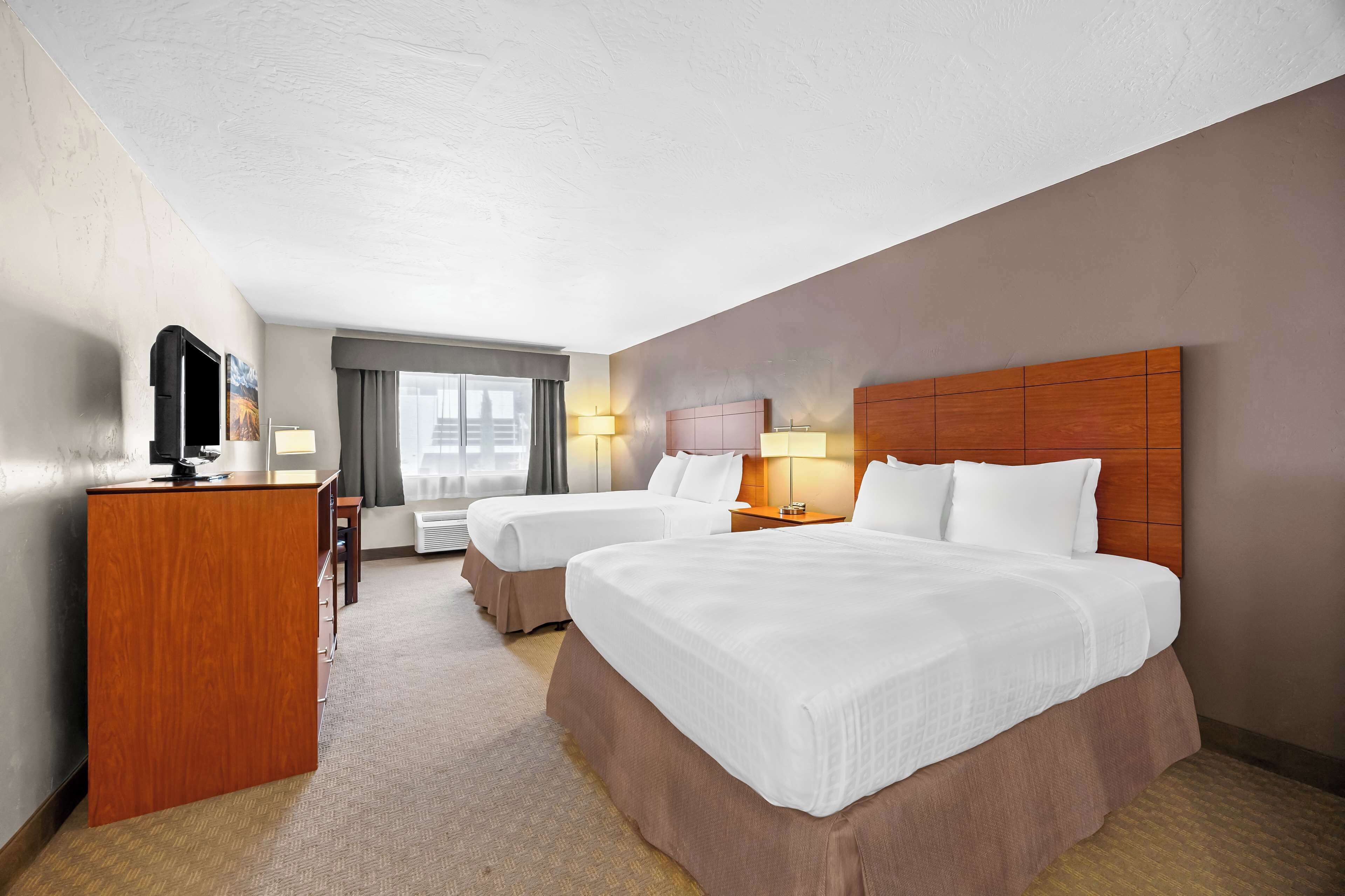 Standard Room, 2 Queen Beds, Non Smoking, Refrigerator & Microwave | Hypo-allergenic bedding, pillow-top beds, in-room safe, desk