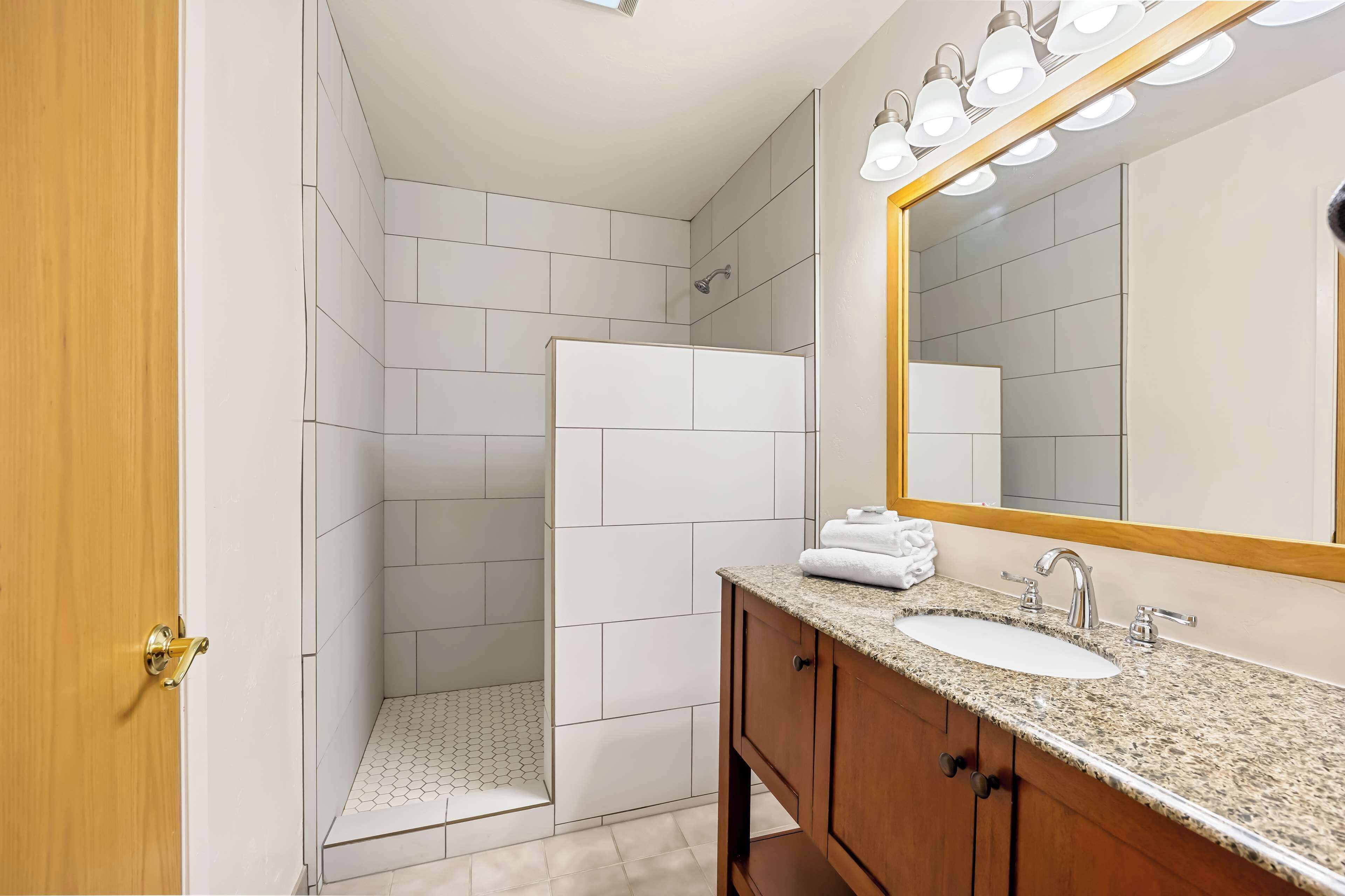 suite, 1 king bed, non smoking, balcony (walk-in shower;with sofabed) | bathroom | free toiletries, hair dryer, towels