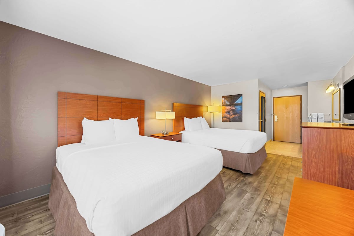 Hypo-allergenic bedding, pillow-top beds, in-room safe, desk
