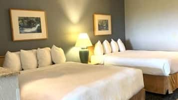 Desk, laptop workspace, bed sheets