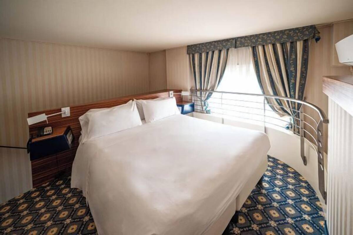 1 Schlafzimmer, hochwertige Bettwaren, Minibar, Zimmersafe