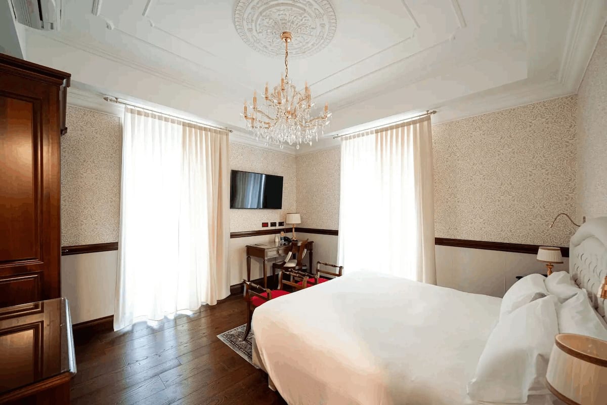 1 habitación, ropa de cama de alta calidad y minibar