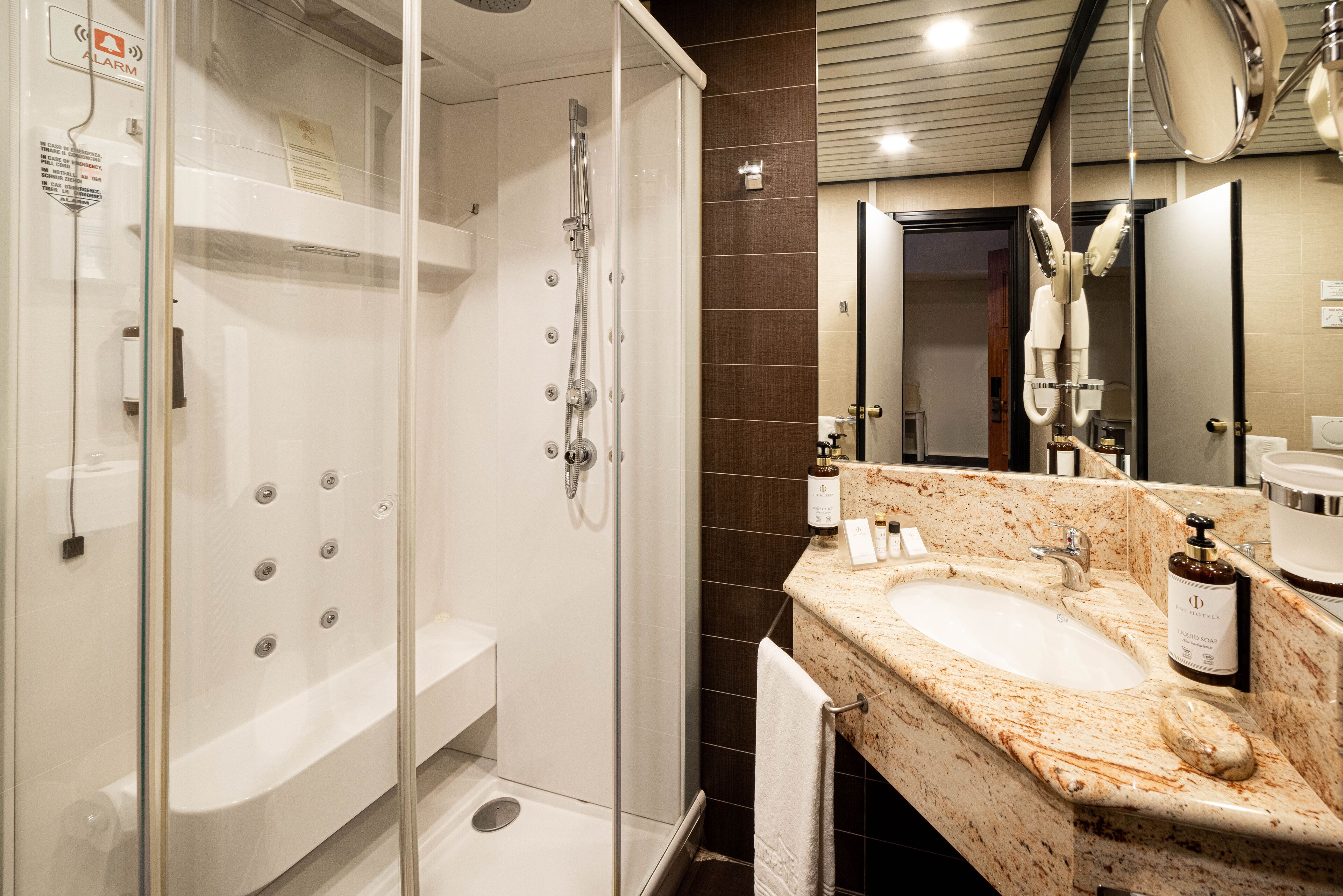 classic room | bathroom | deep-soaking bathtub, rainfall showerhead, hair dryer, slippers