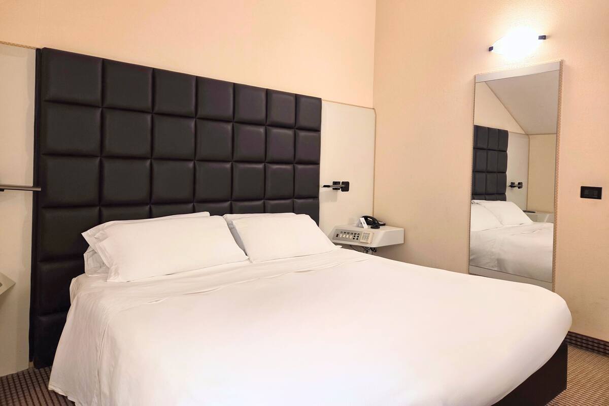 1 habitación, ropa de cama de alta calidad y minibar