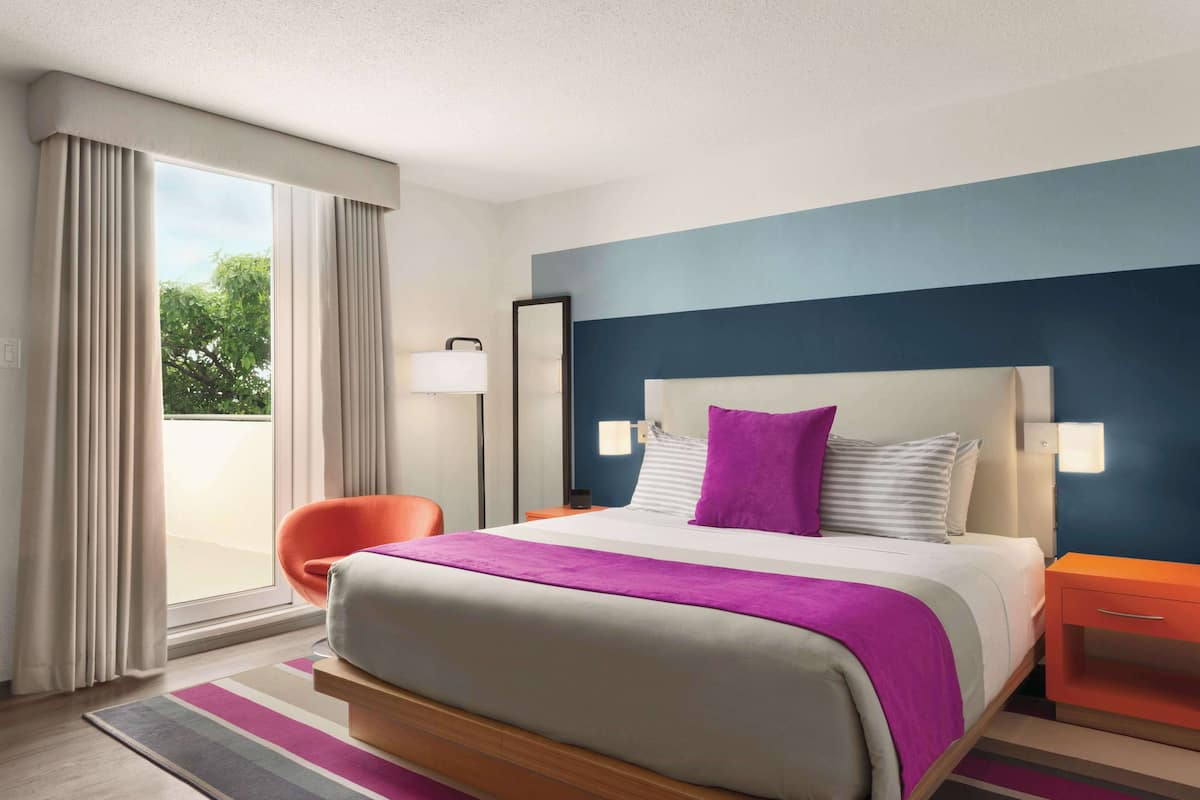 Room, 1 King Bed, Balcony | In-room safe, desk, blackout drapes, iron/ironing board