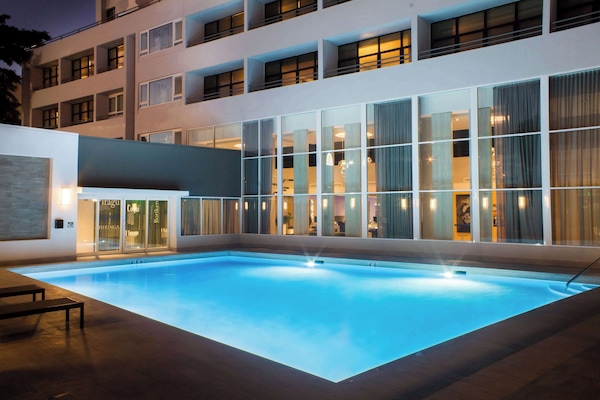 Outdoor pool, open 8:00 AM to 8:00 PM, pool umbrellas, sun loungers