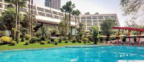 Outdoor pool, open 6:00 AM to 9:00 PM, pool umbrellas, sun loungers