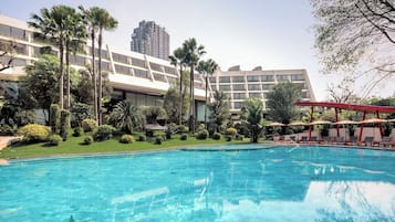 Outdoor pool, open 6:00 AM to 9:00 PM, pool umbrellas, sun loungers