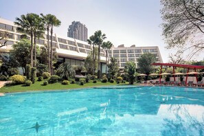Outdoor pool, open 6:00 AM to 9:00 PM, pool umbrellas, sun loungers