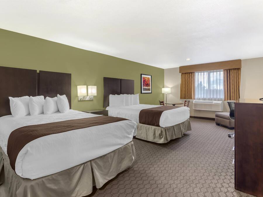 Standard Room, 2 Queen Beds, Non Smoking, Jetted Tub | Premium bedding, pillowtop beds, in-room safe, desk