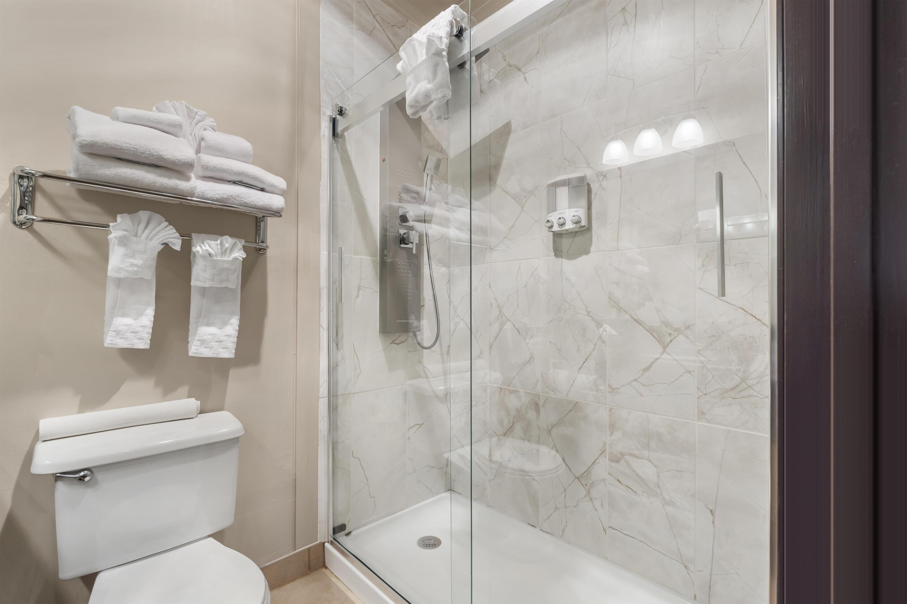 Standard Room, 2 Queen Beds, Non Smoking | Bathroom | Combined shower/tub, eco-friendly toiletries, hair dryer, towels