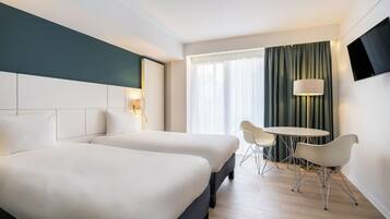 Standardværelse med 2 enkeltsenge | Premium-sengetøj, minibar, pengeskab på værelset, skrivebord