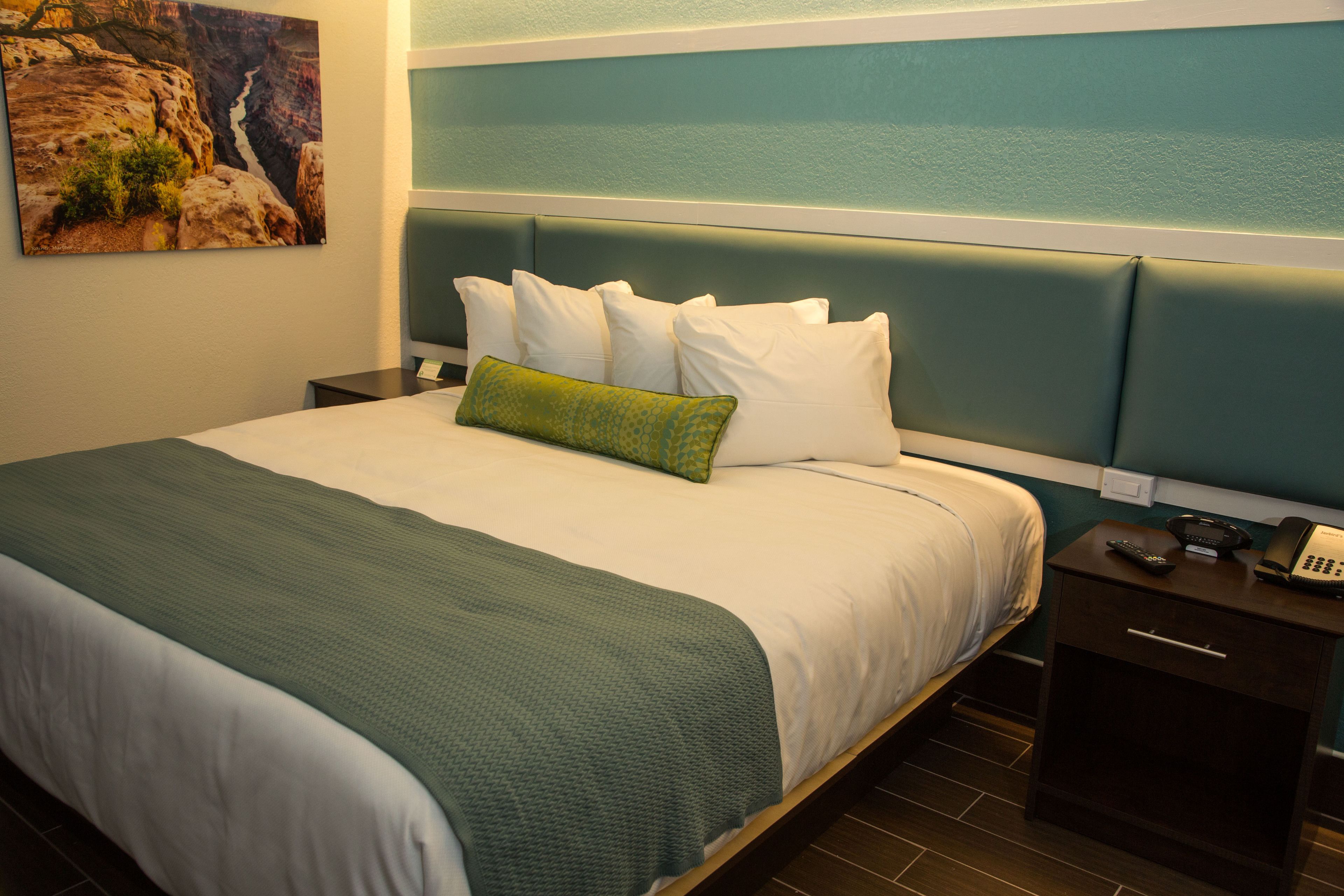 Premium bedding, pillowtop beds, desk, laptop workspace