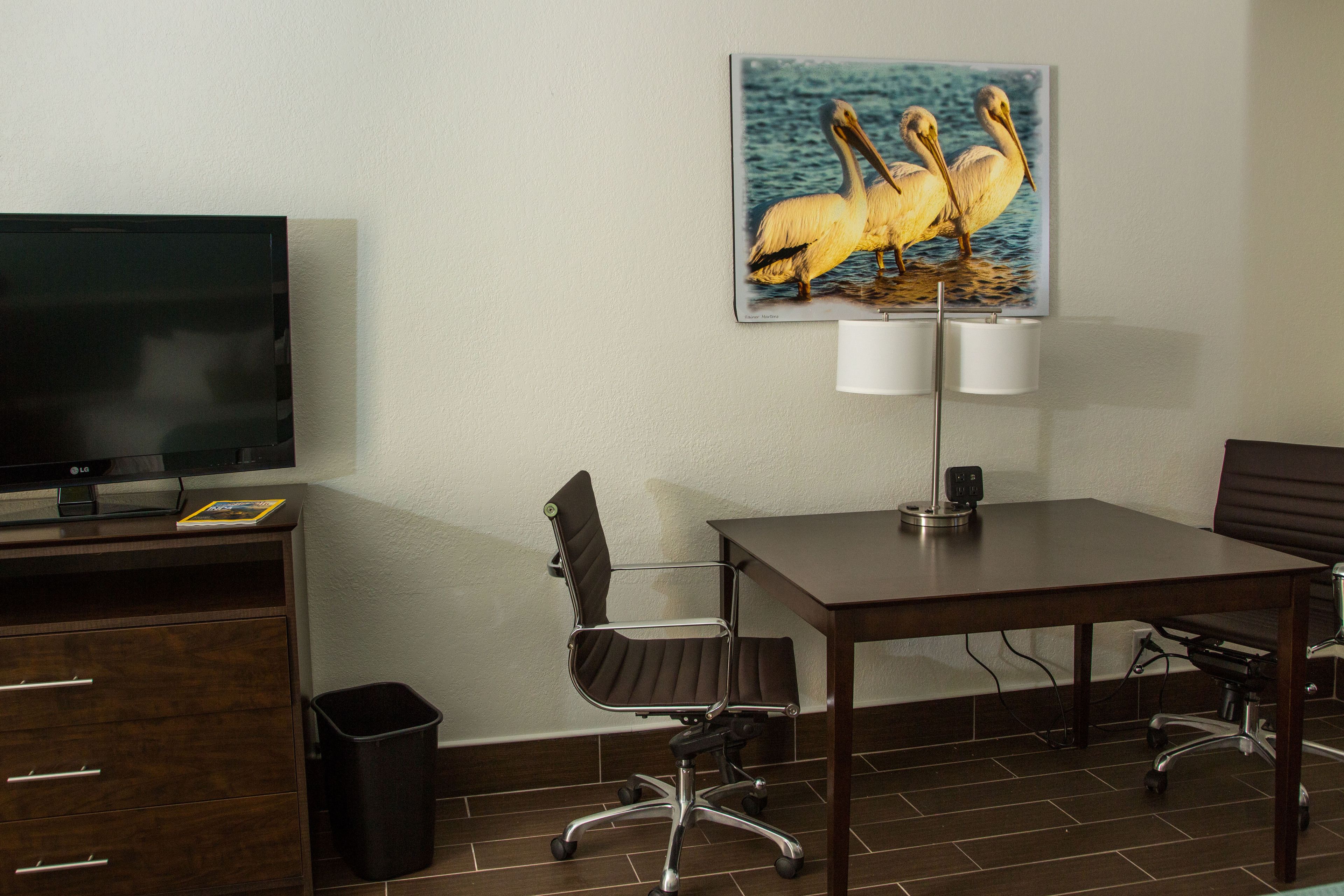 Premium bedding, pillowtop beds, desk, laptop workspace