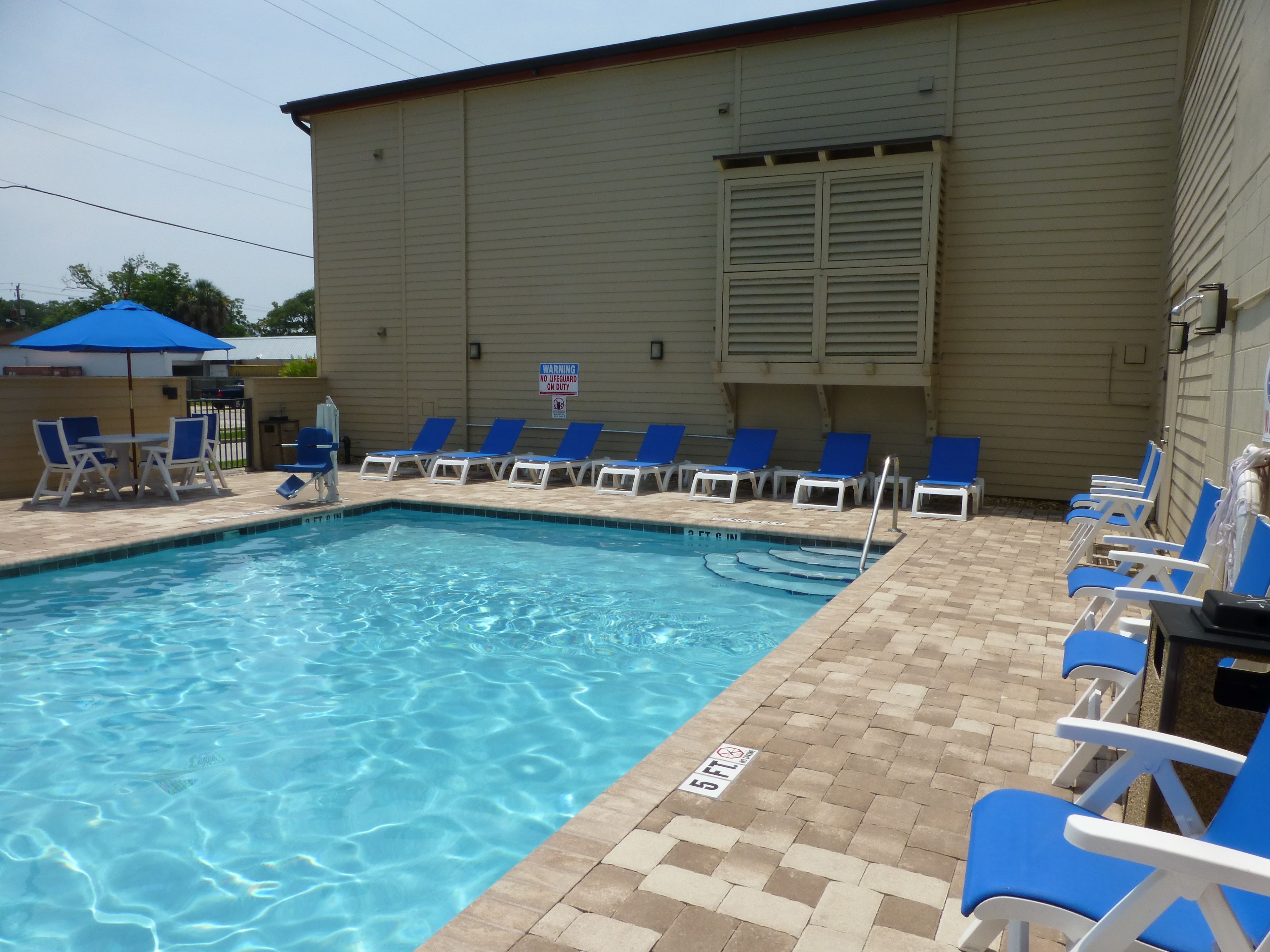 Outdoor pool, open 8:00 AM to 9:00 PM, pool umbrellas, pool loungers