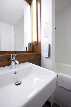 Combined shower/tub, eco-friendly toiletries, hair dryer, towels