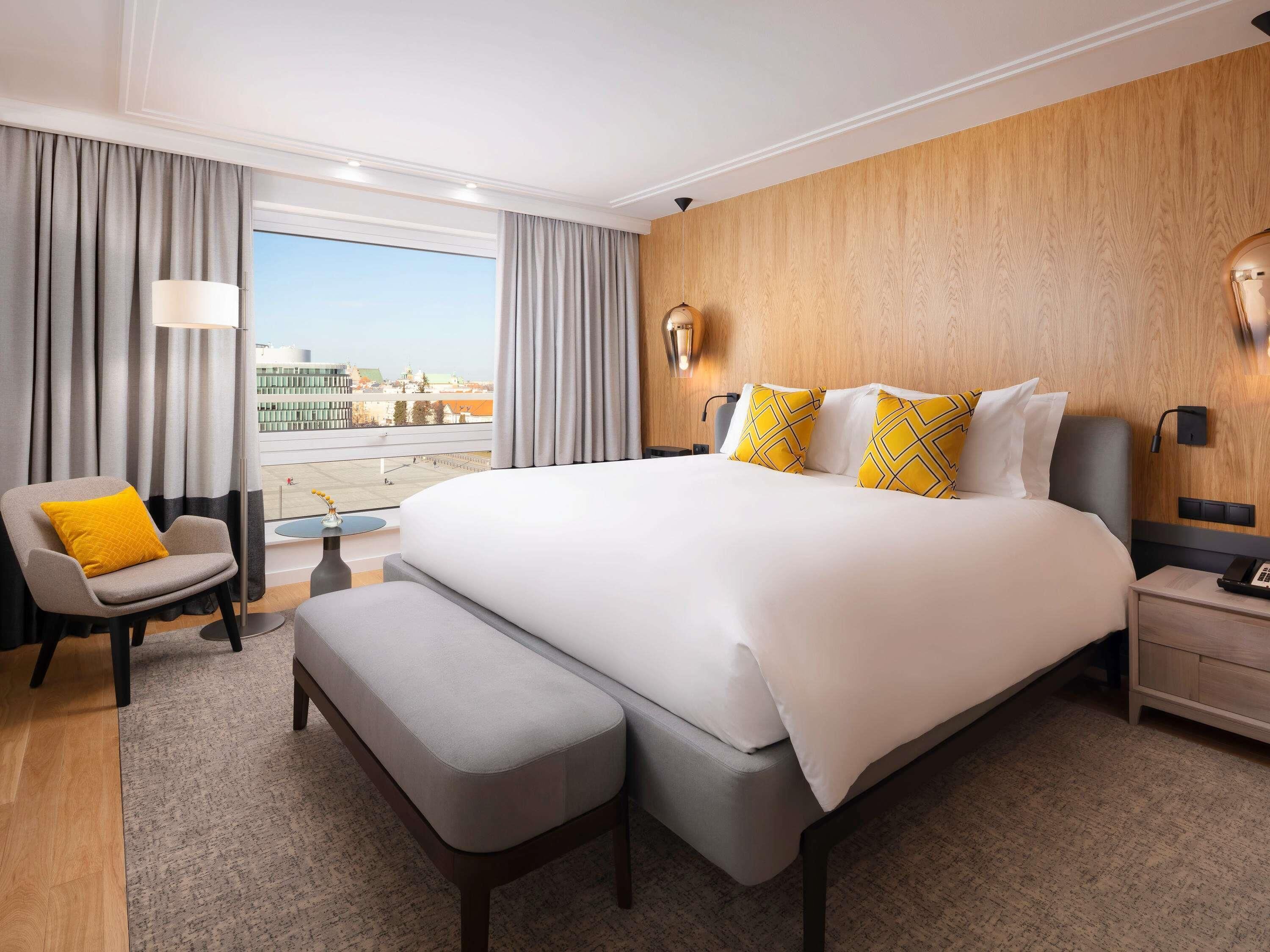 Luxury Suite, 1 King Bed, Kitchenette (Opera) | Premium bedding, in-room safe, blackout drapes, soundproofing
