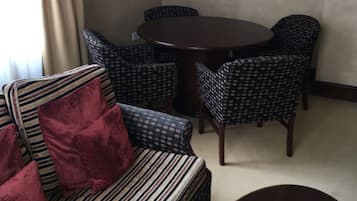 Suite, 1 Double Bed | Living area | Flat-screen TV