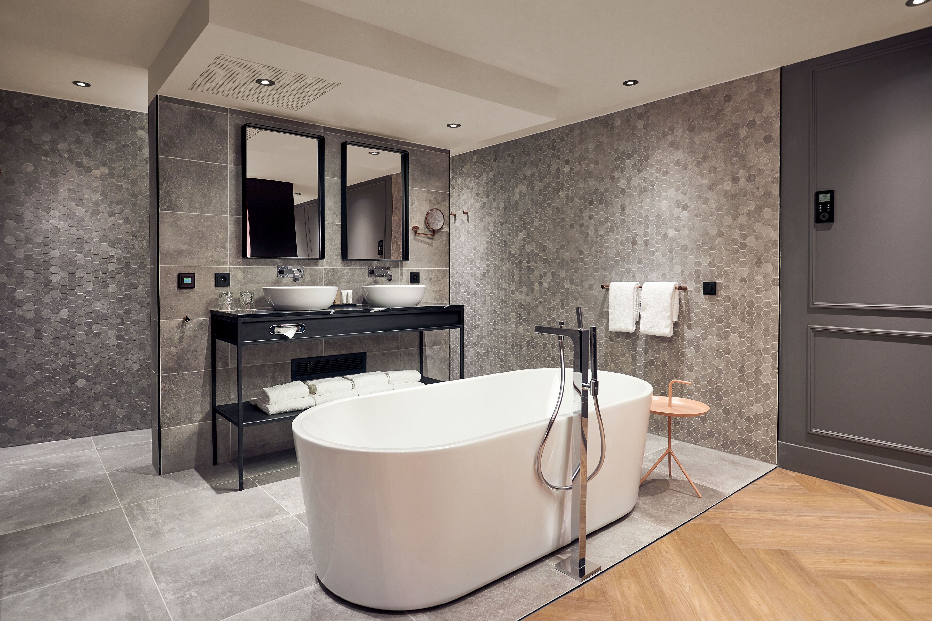 luxury suite | bathroom | eco-friendly toiletries, hair dryer, slippers, towels