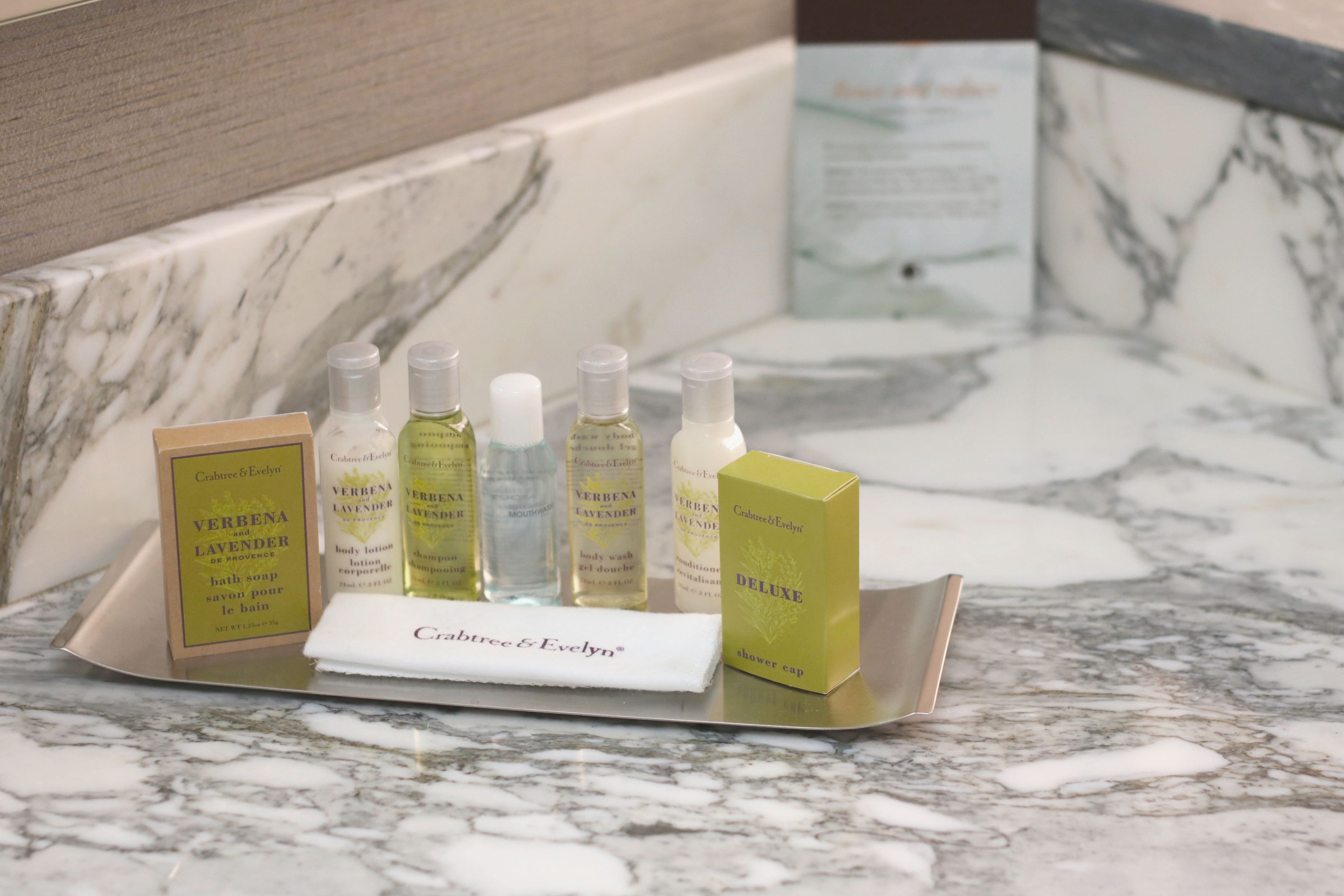 eco-friendly toiletries, hair dryer, towels, soap