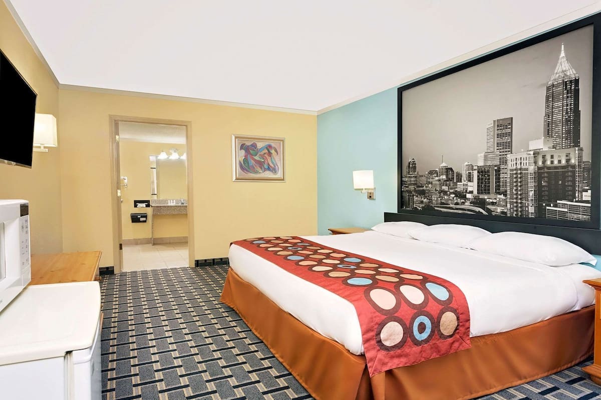 Desk, laptop workspace, blackout curtains, iron/ironing board